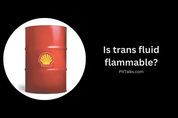 red drum of transmission fluid with the yellow shell racing logo