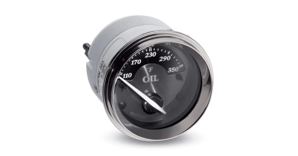 A Harley Davidson oil temperature gauge, used to measure the temperature of the motorcycle