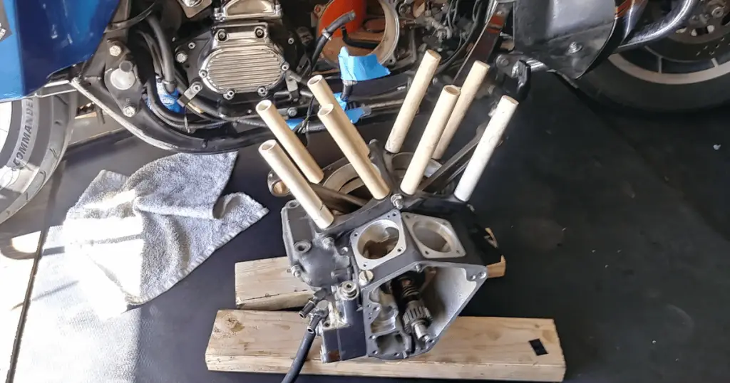 My Harley's engine torn out of the bike for the complete rebuild process, sitting on two wooden planks