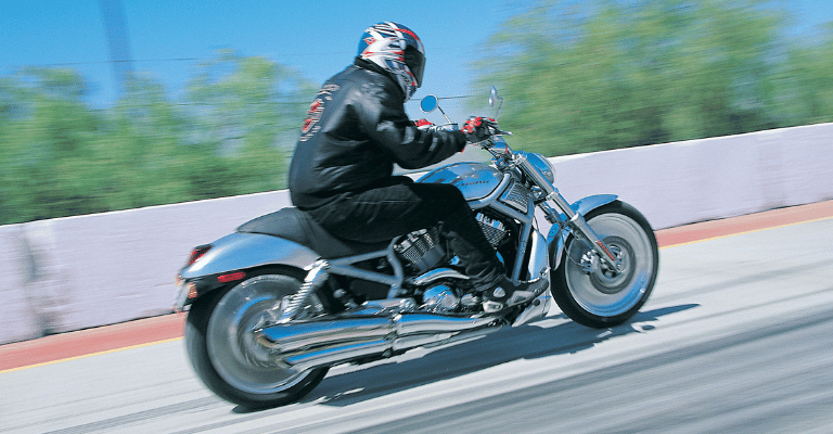 Riding a V-Rod down the highway, blurred background